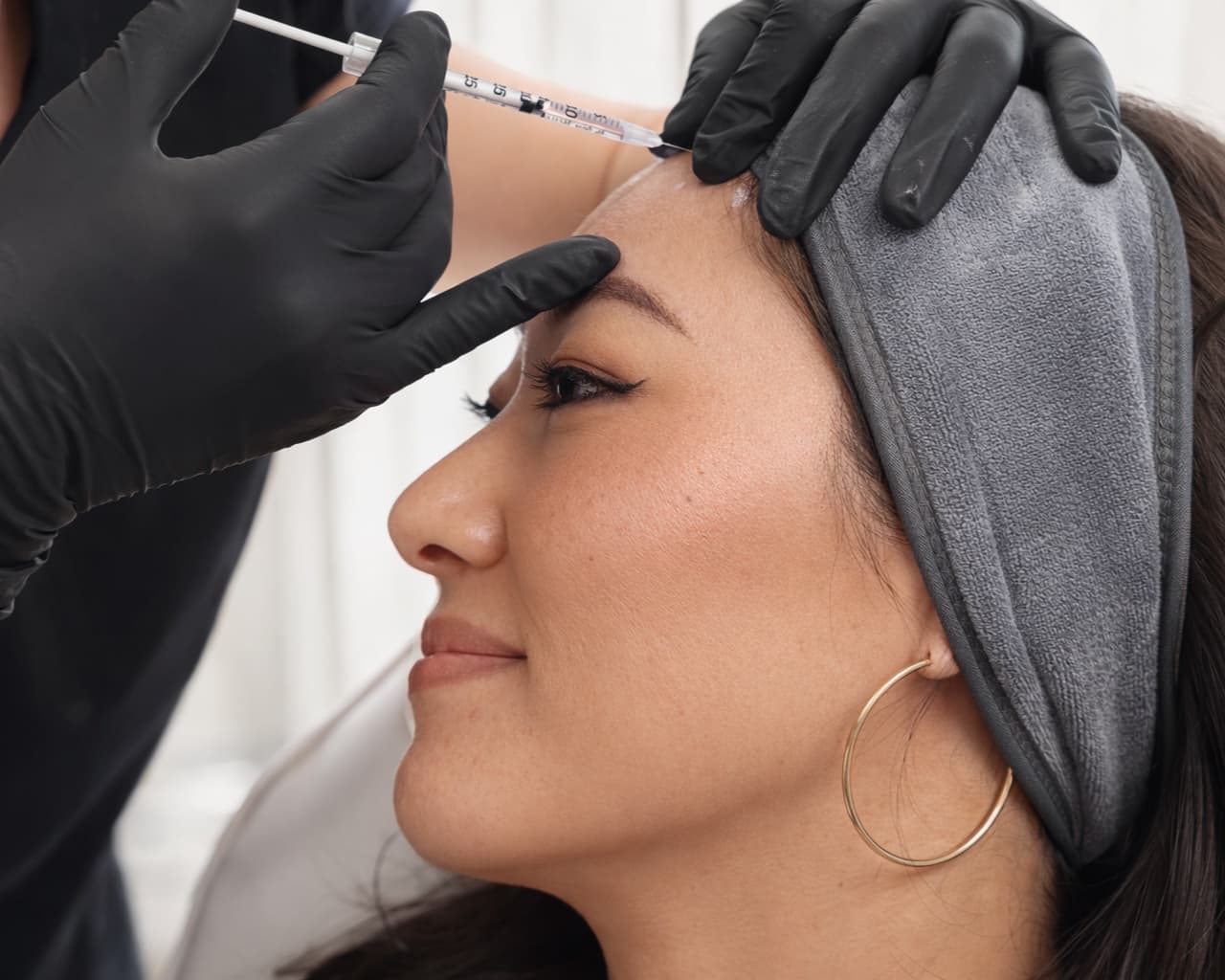 A precise neuromodulator injection during a MeliOra house call