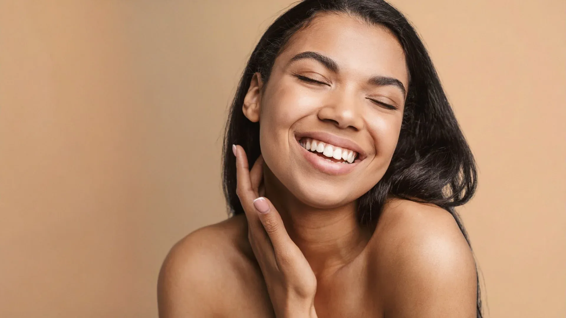 Smiling woman with healthy, glowing skin